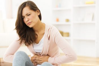 Wat kan de oorzaak van buikpijn zijn?